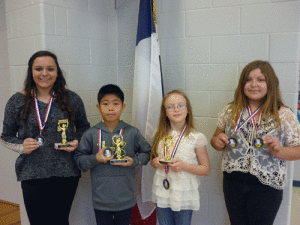 Seadrift School Spelling Bee Winners Krislyn Key, Jacob Nguyen, Alex Mallory, and alternate speller Destiny Garza.