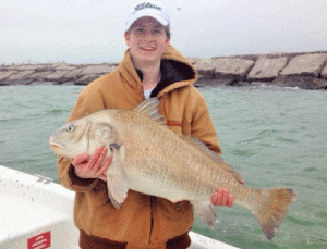 Deitz Brooks from Fort Worth with a 35 inch Black Drum that he caught and released on his Spring Break fishing trip with Capt. RJ Shelly on March 12, 2015.