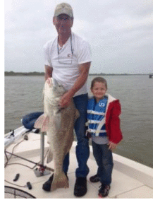 RJ Neal from La Vernia, Texas was visiting his grandparents, the Staffs, in Port O’ Connor over the Easter weekend. On Friday morning he went out with his Grandpa, Darrell Staff of Ganado and his mom, Jessica Neal and he caught this huge drum that weighed over 50 lbs. It was caught and released in the Intracoastal.