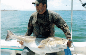Earl Gremillion of McDade, Texas caught and released this 44”, 36 lb. bull red fishing at the jetties in May.