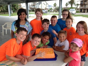 The Student Advisory Board for the Friends of the Port O’Connor Library celebrated a successful and fun year with hot dogs, a scavenger hunt, and a picture right before cutting the cake.
