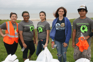 Hope High School Environmental Club took part in a beach cleanup on May 7, 2015. The school is part of the Beach Guardian program with the Texas General Land Office.  The students are responsible for cleaning the Point Comfort Causeway beach along highway 35. Nine bags of trash were collected in a two hour period.  Club sponsor is Laurie Weaver. Pictured (l-r)   Michelle Gamez, Katlyn Pollard, Alexis Rivera, Ravyn Marconi, Rex Cantu 