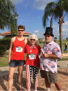 The Fireman’s 4 Race on July 4, 2015 Over-all 1st place winner Bryan C. Golz and oldest overall finisher, Evelyn Burleson. Money raised by this event went toward buying a new fire truck for the POC Volunteer Fire Department.