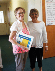 Outgoing President Virginia Lichac (left); Newly elected President, Judy Whitworth (right)