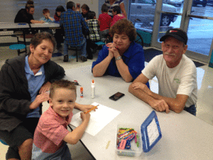 Brennan Gregory with his grandparents, Sandy Gregory and Lori and Billy Hemphill at Grandparents Day at Seadrift School.