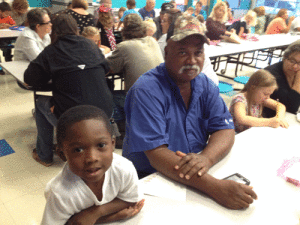 Lamar Williams and his grandfather Ranier Brigham at Grandparents Day at Seadrift School. 