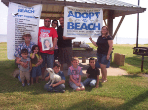 The Gayle family and Tony Belton family at the Fall Adopt-A-Beach on Saturday, September 26.