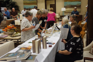 Port O’Connor Librarian Shirley Gordon, and Friends of Library Judy Whitworth and Pam Ray talk with authors Debra Winegarten, Marjorie Brody and Kathleen Bateman. Standing at back is author Doug Hiser.