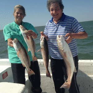 Eileen and Teri from Houston holding some of the redfish they caught on Oct. 2nd. - Capt. RJ Shelly