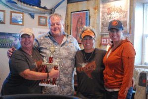Jim Hooper with winners of the Gumbo competition Sue Glover, Nicole Collins and Jeane Newberry
