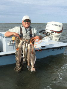 Hurcey T. from Huntsville, Alabama with a limit of Redfish and Trout that he caught while wade fishing with Capt. RJ Shelly on 11/13/15. The fish were caught on Silver Spoons and Soft Plastics.