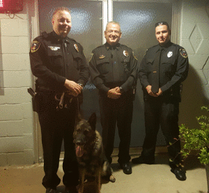 At the December meeting of Seadrift City Countil, the two part-time officers were promoted to full-time positions on the Seadrift Police Department. Pictured above are: Deputy 1, Officer Louis Warren (with K9 Officer Eros), Police Chief Leonard Bermea, and Deputy 2, Officer Robert Montero.