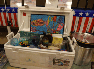 A custom cooler filled with coastal cooking supplies was donated to the POC Muster by Becky Haynes and the Port O’Connor Service Club.