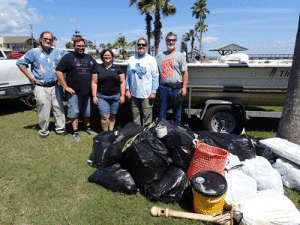 Adopt-A-Beach Coordinator Roxanne Ochoa (3rd from left) and volunteers at King Fisher Beach in Port O’Connor.