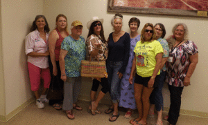 Members of the Port O’Connor Service Club modeled their purchases from their Spring Garage Sale. Pictured left to right: Marie Hawes; Autumn Anderson (most complete Garage Sale outfit); Evelyn Kitchens; Susan Braudaway (most stylish); Susie Onishi; Linda Orrick; Donna Vuichard; Madeline Bourg and Becky Carville.