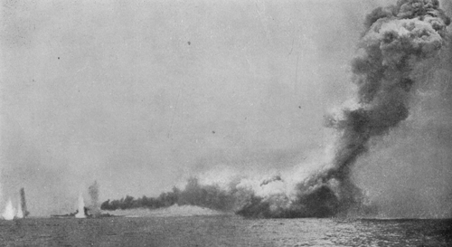 Brithish Battlecruiser HMS Queeen Mary blowing up as HMS Lion dodges German Shellfire nearby. Picture from the Imperial War Museum Archives