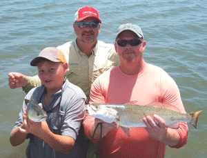 Kirk and Brendon on their 1st Father & Son wade fishing trip. Great times and memories. -Capt. Jeff Larson