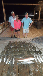 Tim & Sabra on a fishing montage with son Chantz for his birthday and “going off to college” celebration, bayfishing and night flounder gigging. Capt. Chris Cady & Capt. Jeff Larson