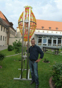 Dieter Erhardd with his “sandwatch” art piece