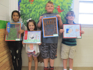 4th Grade Jackie Gutierrez (1st place oil pastel), Rylie Ragusin (2nd place crayon), Christopher Richter, Aiden McClelland 