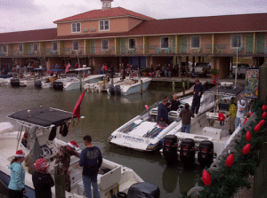 14th Annual Toy Run Boaters arrived at The Inn at Clarks. Locals were waiting to unload the boat-loads of toys. -Photo by Calvin McIntyre