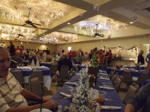 Even the ceiling was beautifully decorated for the Christmas Luncheon. -Photo by Kelly Gee