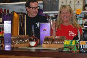 Noral McCauley and Teresa Scott display some of their wares at POC Liquor.
