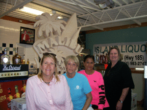 Island Liquor staff (L to R): Diana Hartzler; JoAnn Edwards, Judy Guzman, Gail Parker, owner