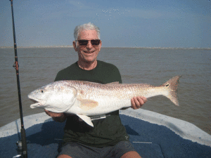 Never having caught a serious fish in his whole life, Alan Springer is really proud of his giant redfish. I think he is now “hooked” on fishing. Fishing this year in Port O’Connor has just simply been fantastic. It is such a pleasure to take friends fishing and watch them enjoy themselves. Yes, just being on the water is fun but actually catching fish adds a whole new level of pleasure to it. - Dave Pope 
