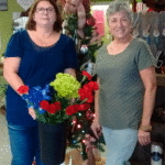 Beverly Clifton and Martie Gonzales Salt Blossom Shop donated door prize flowers