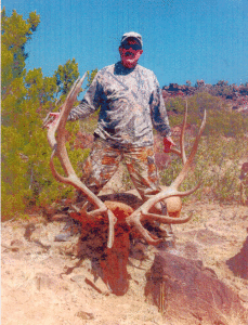 Doyle Adams’ son Jerry and his beautiful elk he shot in Eastern Colorado this year.