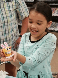 Mimi Mizzell shows her bunny creation at the Friends of the POC Library Easter Egg Decorating Event that was held on March 24 -Photo by Amy Taylor