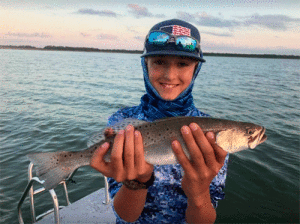 12-year-old Robert with a nice trout Capt. Stephen Boriskie, Bay Flats Lodge