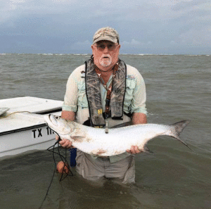 4 foot Tarpon caught in the surf at Pass Cavallo by Alan Cartmell 7/6