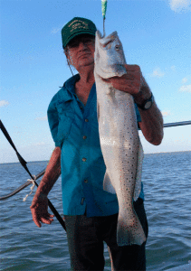 Cap’n Mike Drapela and his 27” Speckled Trout caught June 26 in Port O’Connor