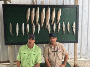 Customers from Houston area in a recent morning trip with Capt. Ron Arlitt of Scales and Tales Guide Service of POC. Limits of reds and trout by 10:00 a.m.