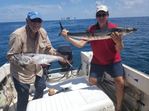 Gerald Pieniazek and Clyde Ellis with nice catch fishing with Captain Roger Ross.