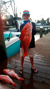 Karsen Beauchamp, 13, of Lufkin, caught his first red snapper fishing with Brad & Kim Morton 40 miles off Port O’Connor. 32”, 16 lb. 7/29