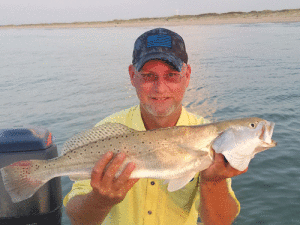 Ol’ High School Buddy Baron Jones with a nice Surf Trout! -Capt. Jeff Larson