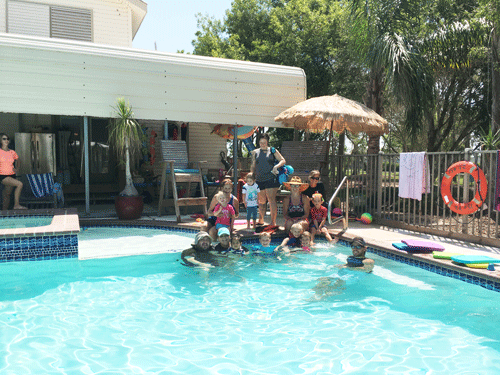 Some of the young swimmers and their family members.