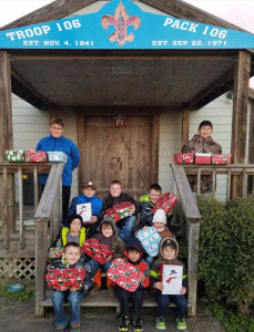 Seadrift Cub Scouts Pack 106 helping collect presents to send overseas and pass out at the food bank.  