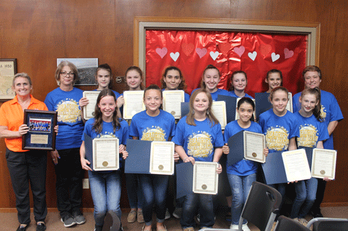 District Champs! 	At Seadrift’s City Council meeting February 5 there were several special guests! The Seadrift School’s winning girls volleyball team were presented with a plaque (held by Seadrift School Principal Lynda Bermea) and awards. Standing proud with heads held high, the girls were accompanied by their coach Kelly Lillge and assistant coach Tanya Cady. Seadrift Mayor Elmer DeForest emceed the ceremony while proud parents looked on! Go, Lady Pirates, Go!  -Tanya DeForest -Photo by Kenneth Reese 
