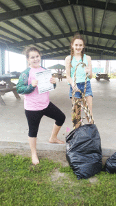 “This is fun!” Kennah Brown & Piper Cranberry at beach clean up.