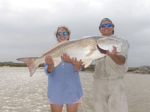 48 inch redfish caught by brother and sister, Conrad Day and Rita Ikeler  out at the jetties in Port O’Connor