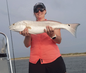 The surf is producing Trout & Reds. Come on down! Allison Meyer with a middle slot Red on the Beach. - Capt. Jeff Larson