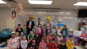 At Seadrift Elementary (left to right): Master Bro. Raul G. Gutierrez,Seadrift Masonic Lodge #1098; Past Master Bro. Ted Gill; Nurse Jill Goode, , with Mrs. Christy and Mrs Whiddon’s First grade students.