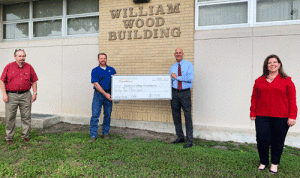 Kevin Riggs, Alcoa Point Comfort Operations plant manager and David Hinds, Victoria College president