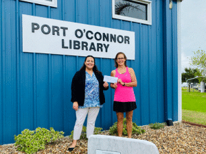 A HUGE thank you to Susan Wallace who presented a generous check to Librarian Michelle Marlin for the Port O’Connor Library. Our community is very grateful for all of the wonderful things that she continues to do for POC! Photo credit: Bob Turner 