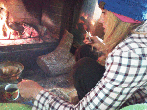 Melissa Tucker makes coffee on the fireplace of her Port O’Connor home. Thank you, Melissa, for building the fire and cooking on it, and thank you, Jessica Diercks, for building us a “tent” around it so we could stay reasonably warm.	-Joyce Rhyne