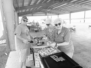 Members of Port O’Connor’s First Baptist Church enjoyed serving lunch to the students and staff of POC Elementary during their Beach Day.